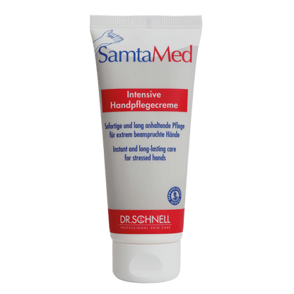 Die weiße Tube der Dr. Schnell SAMTAMED Hautpflege von DR.SCHNELL GmbH & Co. KGaA ist mit blauer und roter Schrift, einem Flip-Top-Verschluss, dem Dr.-Schnell-Logo am unteren Rand und der Hervorhebung der feuchtigkeitsspendenden Wirkung in deutscher und englischer Sprache versehen.