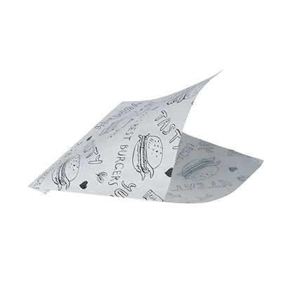 Ein PAPSTAR 1000 Hamburger-Tüten-Blatt (Pergament-Ersatz, fettdicht) der PAPSTAR GmbH, weiß wie Zeitungspapier, zeigt schwarze Burger-Illustrationen, "TASTY", Herzen und Kritzeleien, wobei zwei Ecken leicht angehoben sind, als wären sie gefaltet oder schwebend.