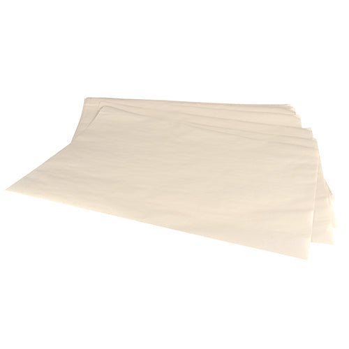Ein Stapel PAPSTAR Flaschenseiden 1/4 Bogen, 50x37,5 cm, weiß (500 Blätter) Verpackungspapier von PAPSTAR GmbH auf einer ebenen Fläche ausgelegt.