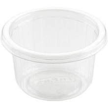 Der Duni GmbH Dressingbecher Fixpack Transparent APET 80x80x46 mm (Packung 50 Stück) ist ein kleiner, gerippter, breitrandiger Behälter, ideal für Saucen oder Gewürze, leer auf weißem Hintergrund dargestellt.