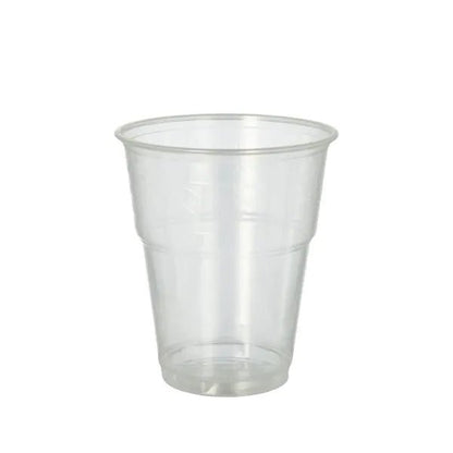 Der PAPSTAR GmbH 70 Kaltgetränkebecher, PLA "pure" glasklar mit Schaumrand, ist ein umweltfreundliches Becher-Ideal zum Servieren von Kaltgetränken und hier leer vor einem schlichten weißen Hintergrund abgebildet.