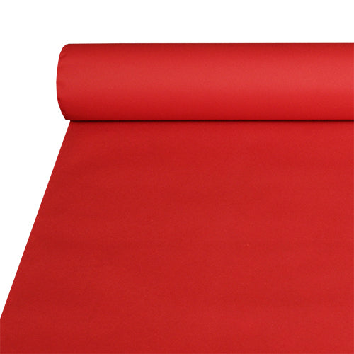 A large roll of Starpak tablecloth, fabric-like Airlaid (20m x 1.2m), partially unrolled on a flat surface, showing its smooth, fabric-like appearance that is durable and easy to clean.