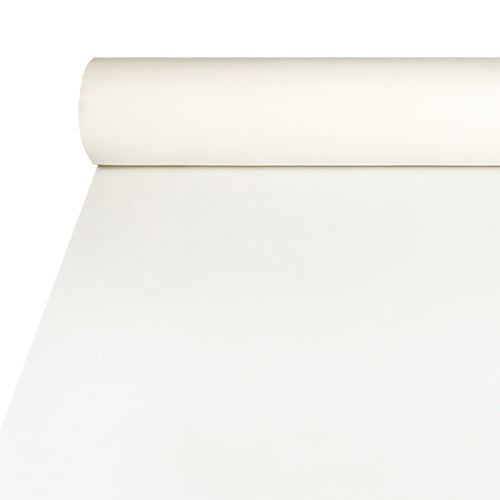 A roll of Starpak discontinued product tablecloth, fabric-like Airlaid (20 m x 1.2 m, white), is partially unrolled on a flat surface like a tablecloth, with the roll on top and the paper running downwards.