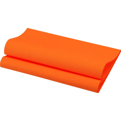 A bright orange mat, reflecting the look of the Bio-Dunisoft napkins 40 x 40 cm 1/4 fold from Duni GmbH, is partially rolled and folded on a white background, showing its textured surface and clean edges.
