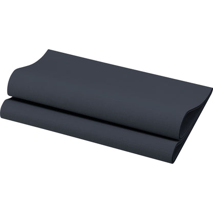 The Bio-Dunisoft napkins 40 x 40 cm 1/4 fold from Duni GmbH, here partially folded on a white background, combine comfort and style - ideal for anyone looking for biodegradable products for daily use.