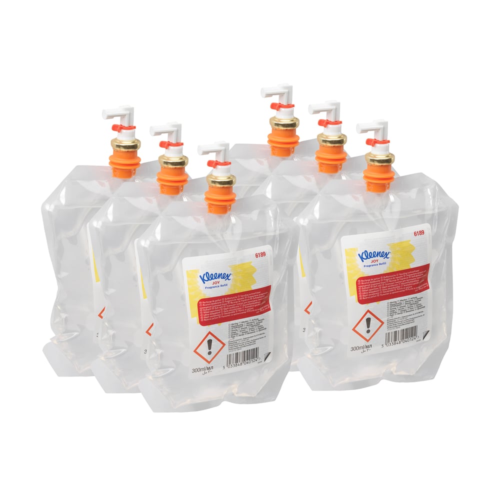 Six transparent 300-ml Kleenex® Fragrance Joy refill packs from Kimberly-Clark GmbH in a 6-pack dispenser with an orange-and-white spout, labeled for use in the bathroom and featuring warning symbols.