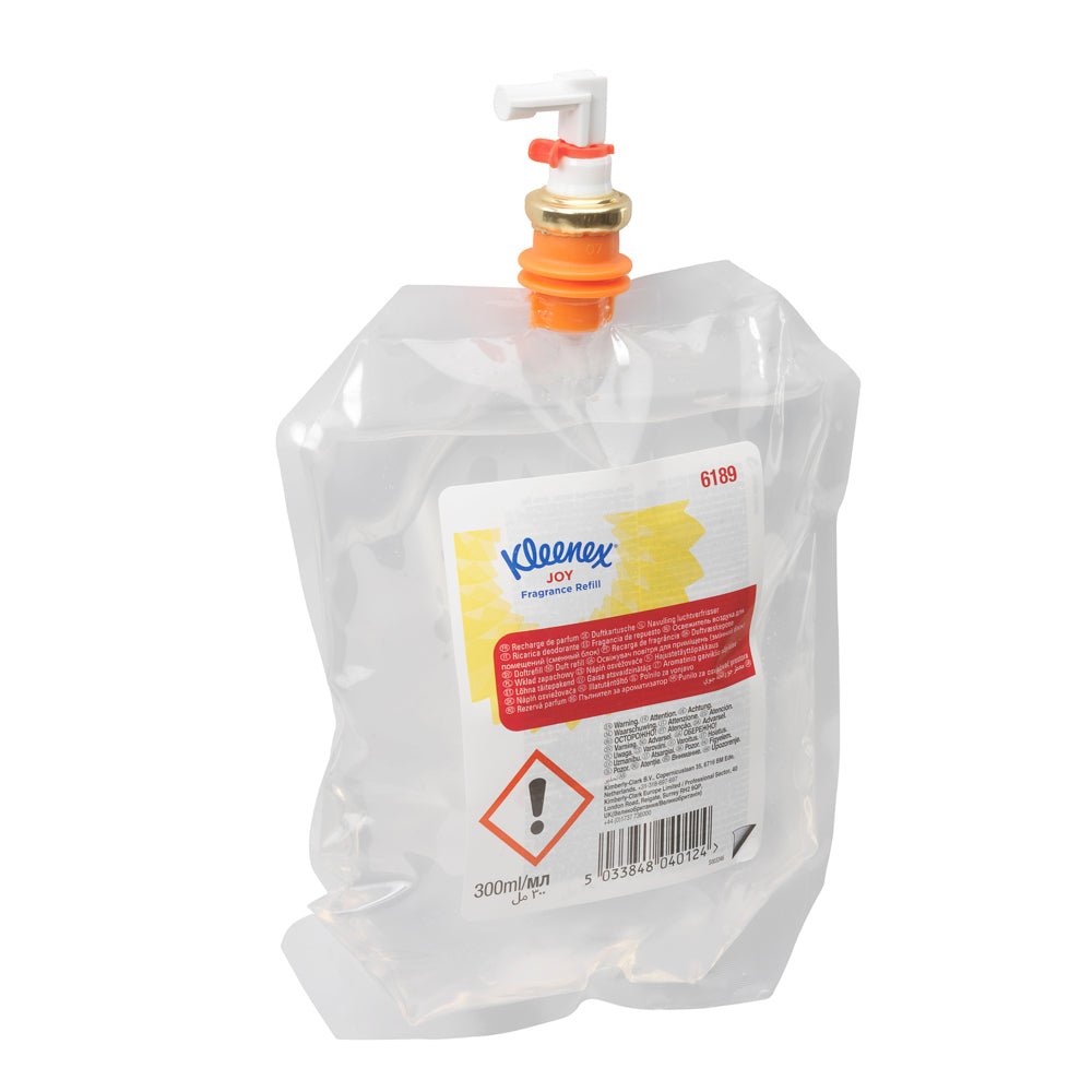 A transparent 300 ml Kleenex® Joy Scent refill pack from Kimberly-Clark GmbH with a white and orange cap, product details, and barcode—ideal for use in cassette-style bathroom air fresheners. The pack contains 6 refill bottles per carton.