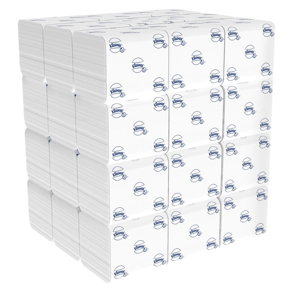 A large stack of Kleenex® toilet paper single sheet system (36 x 200 sheets), each in white packaging with a blue Kimberly-Clark logo, neatly arranged in a cube.