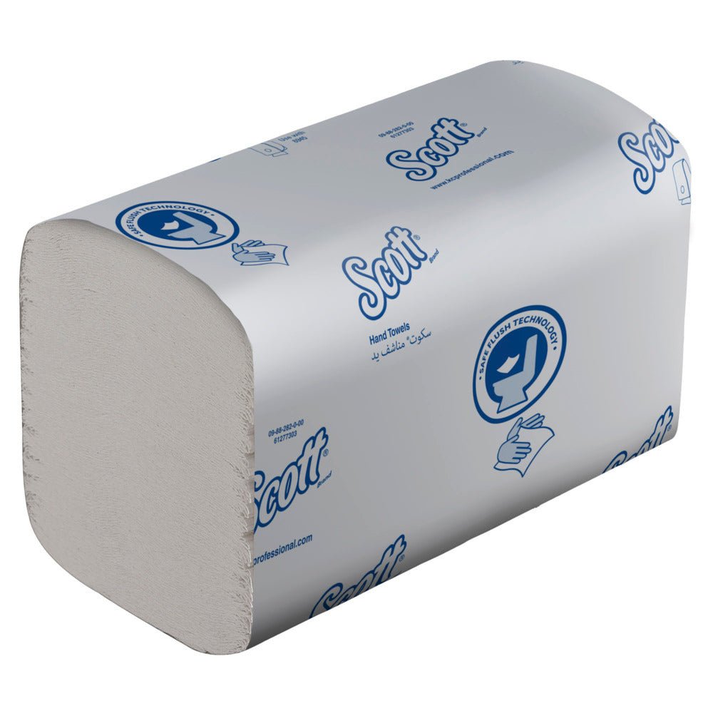 A stack of white Scott® Control™ flushable folded towels from Kimberly-Clark GmbH, 15 clips x 322 sheets per box, in branded packaging with blue logos, designed for hygienic hand drying.