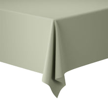A close-up of the Dunicel roll pistachio green 25 m from Duni GmbH, a premium tablecloth roll (1 piece), elegantly draped over a rectangular table for stylish table decoration against a white background.