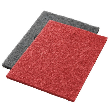 Two Twister Pads from Diversey Deutschland GmbH & Co. OHG, red and gray, lie flat and partially overlapping on a white background – ideal scrubbing and deep cleaning pads.