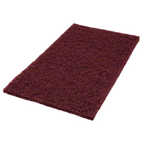 The Twister Pad purple, square from Diversey Deutschland GmbH & Co. OHG for the maintenance cleaning of coated hard floors has a rough surface and is rectangular and burgundy on a white background.