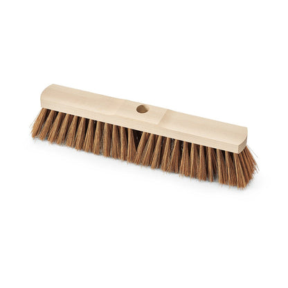 The Nölle Profi Brush hall broom Poly-Coconut saddle wood with handle hole from Nölle Profi Brush Brush & Paint Technology e.K. has dense brown poly-coconut bristles and a central handle hole, depicted on a white base.