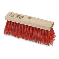 The Nölle Profi Brush "Elaston Bauernlob" street broom from Nölle Profi Brush Bürsten- & Pinseltechnik e.K. features a wooden head with dense red Elaston bristles, a central grip hole, and the inscription "BAUERNLOB MADE IN GERMANY."