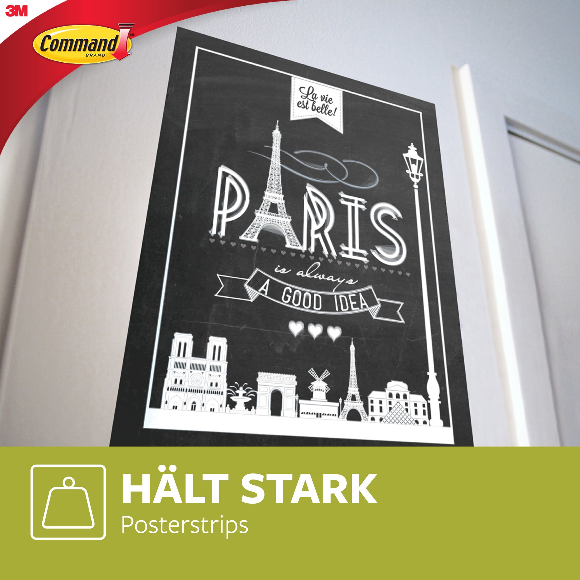 Ein schwarz-weißes Paris-Poster ist mit 3M Deutschland GmbH Command™ Poster-Strips im Vorteilspack (17024-VP) befestigt. Links oben ist das Command-Logo zu sehen, darunter ein grünes Etikett mit der Aufschrift "HÄLT STARK Posterstrips" neben einer einfachen Hängerahmen-Abbildung.