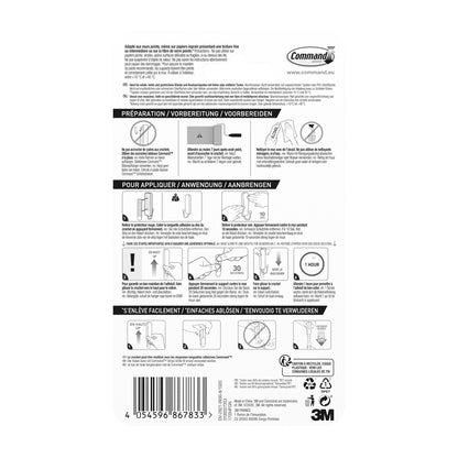 Rückseite einer Verpackung der 3M Deutschland GmbH Mittelgroßer Command™ Metallhaken in gebürstetem Nickel, 17034 (1 Haken, 2 Streifen) mit Schritt-für-Schritt-Abbildungen Haken ohne Bohren und Produktdetails in mehreren Sprachen.