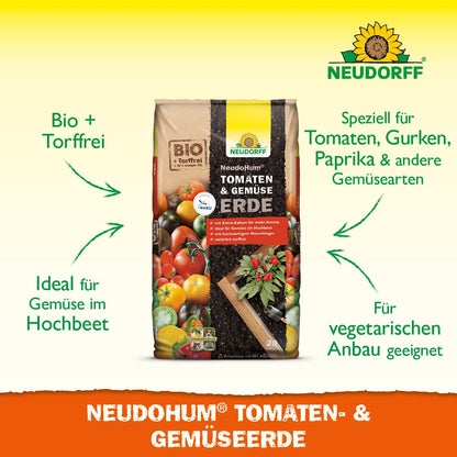 A bag of NeudoHum Tomato & Vegetable Soil from the Neudorff Shop is shown with fresh tomatoes and summer vegetables. The peat-free soil is suitable for raised beds and provides nutrients for vegetarian cultivation.