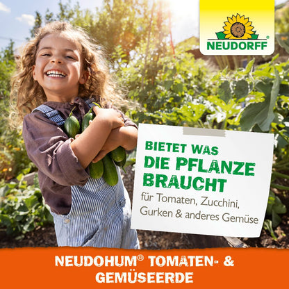 A smiling child in a garden holds zucchinis - fresh summer vegetables. Green plants thrive in the background. A sign reads: "NeudoHum Tomato & Vegetable Soil - provides everything for tomatoes, zucchinis, cucumbers & other vegetables." Neudorff Shop logo at the top right.