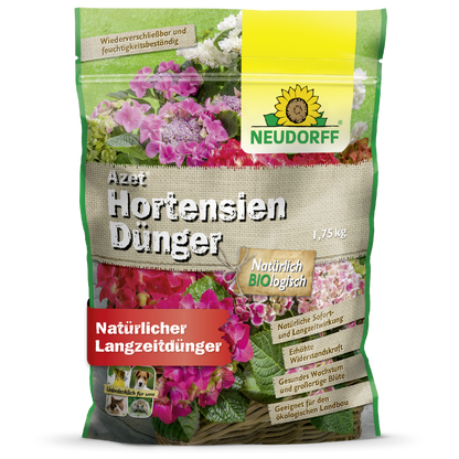 A 1.75-kg bag of Neudorff Shop Azet HortensienDünger, a natural fertilizer for garden hydrangeas, with packaging featuring pink and white blooms and German text.