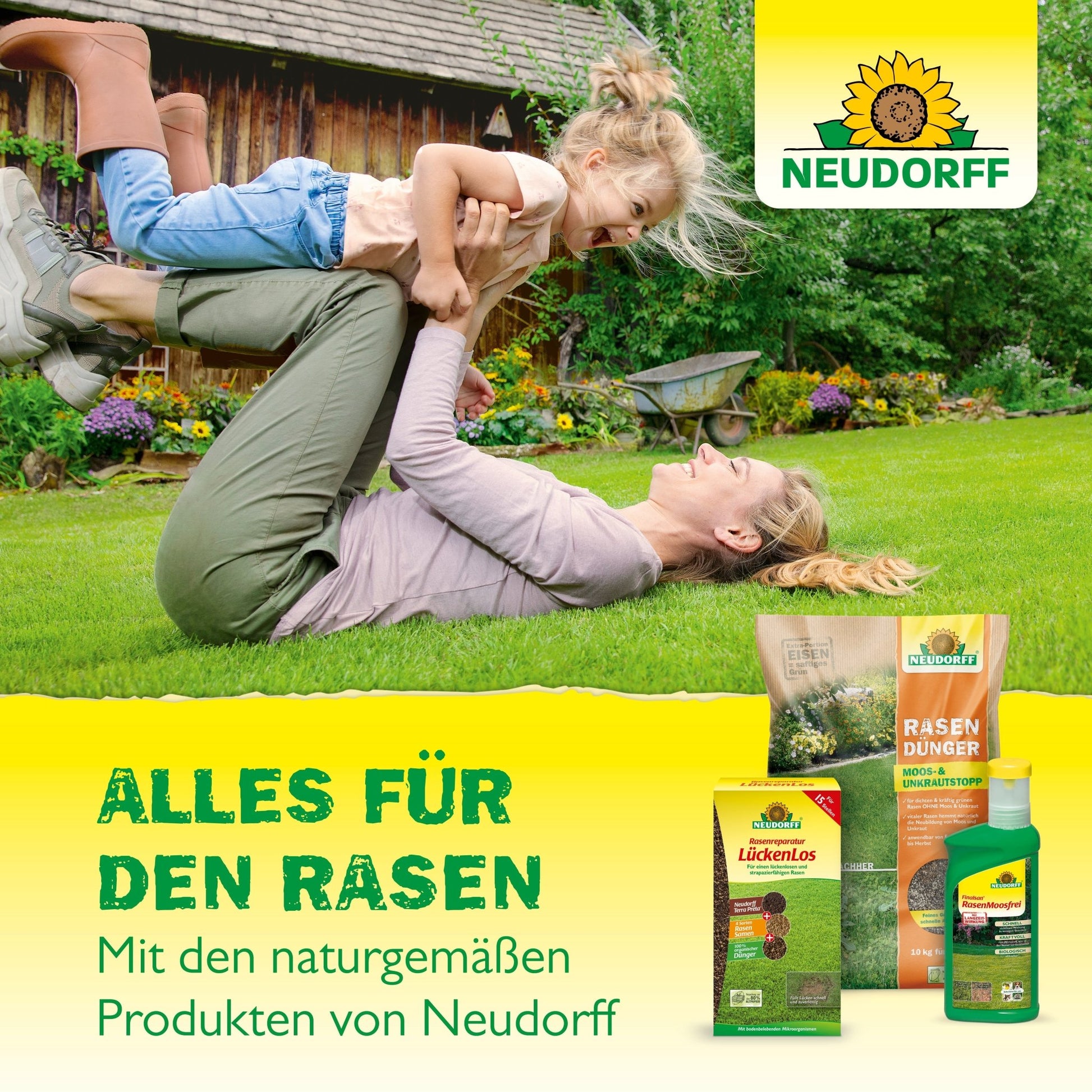 A woman in the grass lifts a smiling child high. In the foreground are the Azet Lawn Fertilizers from Neudorff Shop 2.5 kg to 5 kg - ideal for dense lawns. The text reads "EVERYTHING FOR THE LAWN" and "With Neudorff's natural products."