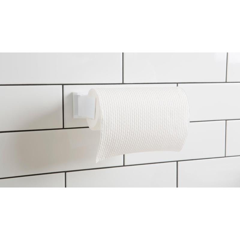 A roll of white textured toilet paper is mounted on a holder using the 3M Germany GmbH Scotch-FIX™ Double-Sided Indoor Mounting Squares 4496-ST16-P (25 mm x 25 mm, 16 pieces/package) for strong, reliable indoor mounting on tiled walls.