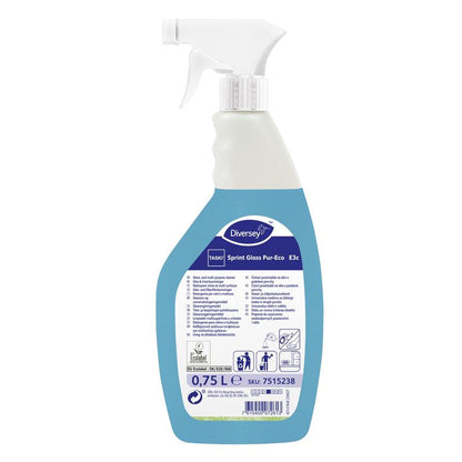 A white-blue spray bottle labeled "TASKI Sprint Glass Pur-Eco glass and surface cleaner" from Diversey Deutschland GmbH & Co. OHG contains 0.75 liters of environmentally friendly cleaner, with usage instructions on the back label.