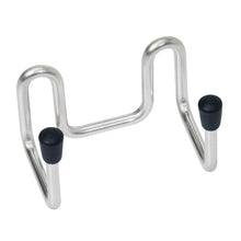 The TASKI accessory hook from Diversey Deutschland GmbH & Co. OHG is a silver, zigzag-shaped hook with two prongs, each fitted with a black rubber cap - ideal for storing cleaning accessories against a white background.