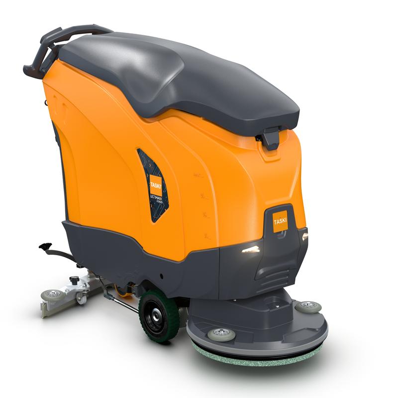The TASKI ULTIMAXX 2900 SD50 from Diversey Deutschland GmbH & Co. OHG is a next-generation scrubber-dryer with an orange-gray housing, 63-liter tank, rear steering handle, wheels, and a brush on the floor. Pictured on a simple white background.