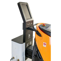A touchscreen control panel stands next to an orange-gray TASKI GS Ecobot 50P with a hose, a "No Smoking" sticker, and the TASKI GS Service Station 50 from Diversey for combined charging of electricity and water. (1 package).