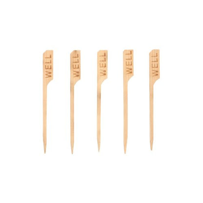 Fünf PAPSTAR 250 Steak-Marker 9 cm der PAPSTAR GmbH, jeweils mit der Gravur „WELL“, sind in einer Reihe angeordnet, ideal für Restaurants, um gut durchgebratene Steaks deutlich zu kennzeichnen.