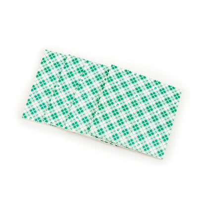 A pair of Scotch-FIX™ Double-Sided Indoor Mounting Squares 4496-ST16-P (25 mm x 25 mm, 16 pieces/package) from 3M Germany GmbH with a green checkered pattern offer strong adhesive power for secure indoor attachment.