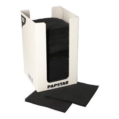 In a white dispenser box with the inscription "PAPSTAR GmbH" are 100 black PAPSTAR napkins, 2-ply "PUNTO" 1/4-fold (20x20 cm), with some napkins elegantly presented outside.