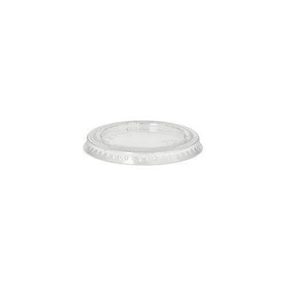 The transparent, round PAPSTAR Lids for single-serving cups (Ø 6 cm, PLA "pure") from the PAPSTAR The GmbH logo appears on a white background, with a flat top and a raised, ridged rim for a secure fit. The package contains 50 biodegradable lids.