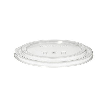 A PAPSTAR 50 lid for salad bowls, round clear 2 cm height PLA of PAPSTAR GmbH is depicted lying flat on a white background. This compostable, eco-friendly lid fits disposable cups or containers.