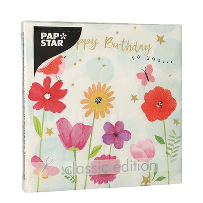 The PAPSTAR 20 napkins (33x33 cm, 3-ply, 1/4-fold) from PAPSTAR GmbH feature red, pink, and yellow flowers, a bird, a butterfly, golden stars, and the text "Happy Birthday to you..." with the PAPSTAR logo at the top left.