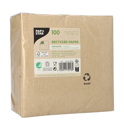 A pack of 100 napkins from PAPSTAR GmbH, 3-ply, 1/4-fold, 33 cm x 33 cm, made from recycled brown paper in clear plastic packaging with environmental and recycling symbols on the packaging.