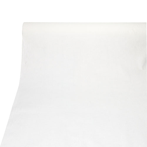 A tablecloth from PAPSTAR GmbH from the ROYAL Collection (PV-Tissue Mix, 20 m x 1.18 m) is rolled out on a flat surface, with its fabric-like, smooth texture and straight edges visible in the foreground.