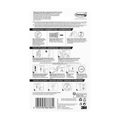 Rückseite des 3M Deutschland GmbH Mittelgroßer Command™ mattschwarzer Haken, 17034B, zeigt mehrsprachige Anleitung mit Diagrammen zur Anwendung und Entfernung, Schritt-Symbolen und einem Barcode; enthält 1 Haken und 2 Strips.