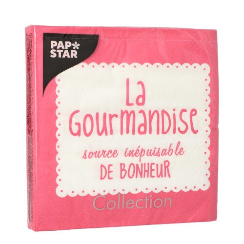A pink package PAPSTAR 20 napkins, 33x33 cm, 3-ply, with a white, wavy label bearing the inscription "La Gourmandise, source inépuisable de bonheur." "PAP STAR" is written in the upper left corner, and "Collection" is written at the bottom.