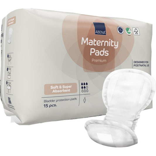 Auf einer Packung mit der Aufschrift "ABENA Maternity Pad, Premium | Packung (15 Paare)" der Abena Re-Seller GmbH sind Symbole für Weichheit, hohe Saugfähigkeit (saugfähige Binden) und Verwendung nach der Geburt abgebildet, wobei ein Tampon auf der Vorderseite der Verpackung abgebildet ist.