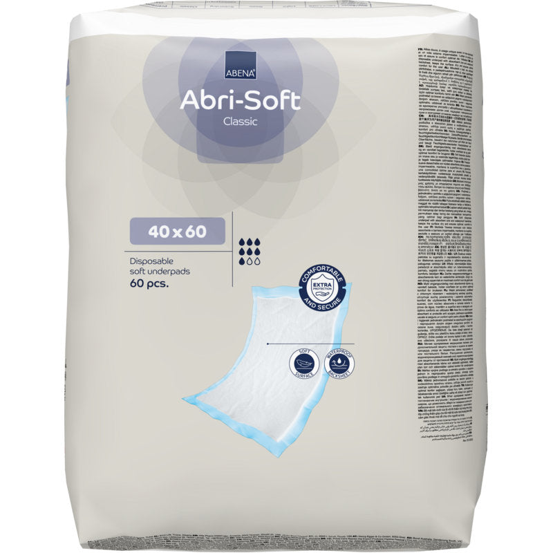 Eine Packung Einweg-Unterlage, Abri-Soft Classic, 40x60 cm, Blau (60 Stück) von Abena Re-Seller GmbH. Auf der Verpackung sind Produktdetails, Symbole und eine Unterlagenskizze abgebildet.