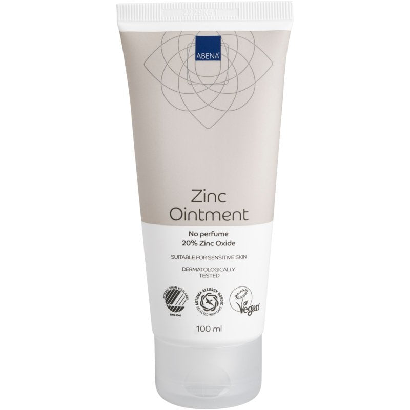 A 100 ml tube of Abena Re-Seller GmbH zinc ointment (20% zinc oxide), fragrance-free, vegan, dermatologically tested and suitable for sensitive skin. Supports regeneration. Available in a white tube with a beige cap; box contains 12 packs.