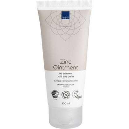 A 100 ml tube of Abena Re-Seller GmbH zinc ointment (20% zinc oxide), fragrance-free, vegan, dermatologically tested and suitable for sensitive skin. Supports regeneration. Available in a white tube with a beige cap; box contains 12 packs.