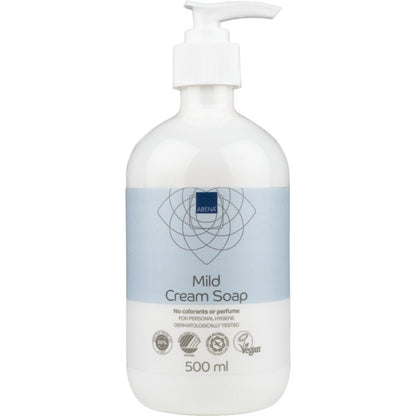 A white plastic pump bottle labeled "Mild Cream Soap without Perfume" by Abena Re-Seller GmbH, featuring a blue-white design. The 500 ml product is dermatologically tested, vegan, and has certifications on the label.