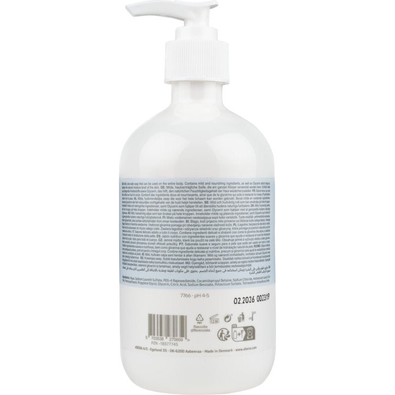 A transparent plastic bottle with a white pump dispenser labeled "Mild Cream Soap without Perfume" by Abena Re-Seller GmbH is equipped with a large blue-white label and multilingual product information on the back.