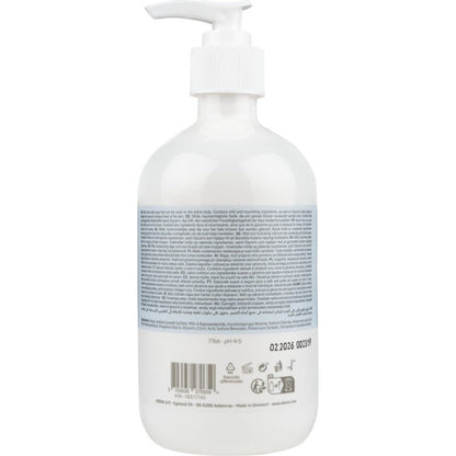 A transparent plastic bottle with a white pump dispenser labeled "Mild Cream Soap without Perfume" by Abena Re-Seller GmbH is equipped with a large blue-white label and multilingual product information on the back.