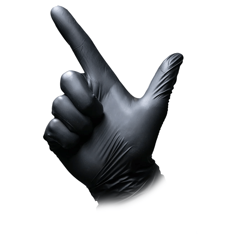 A hand wearing an AMPri MED-COMFORT BLACK nitrile glove from AMPri Handelsgesellschaft mbH is depicted against a white background. The hand is positioned with the index finger pointing upward and the thumb extended sideways, forming an "L."