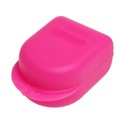 An AMPri PP Dental braces box for children in bright pink, measuring 90 x 60 x 45 cm, has a rounded top and a snap closure on the front. This portable and compact container from AMPri Handelsgesellschaft mbH is ideal for storing small, important items.