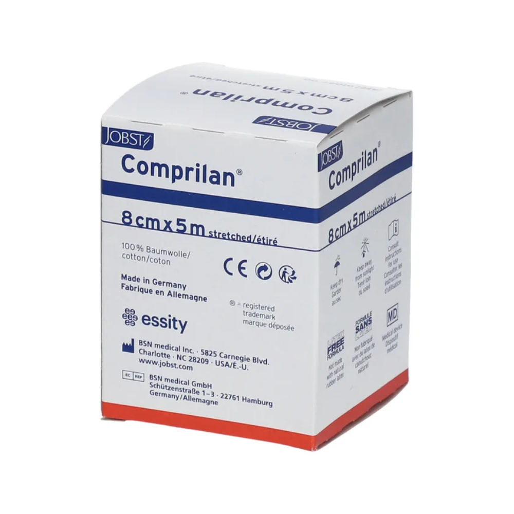 The packaging of the BSN Comprilan® elastic bandage, a compression bandage measuring 8 cm x 5 m and made of 100% cotton, is available in a white box with blue and red accents. It contains manufacturing details and contact information for BSN Medical GmbH in Germany.