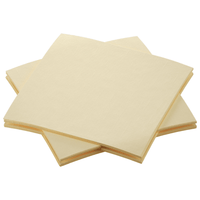 A set of four organic Dunisoft® napkins from Duni GmbH in an elegant beige is neatly arranged, with each napkin slightly overlapping the others. Featuring a subtle textured pattern and a white background, these napkins are perfect for lovers of sustainable dining.